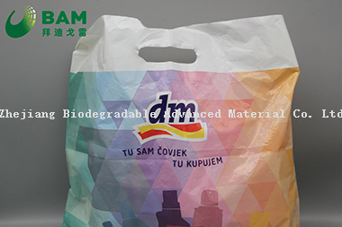 Sustainable Packing Biodegradable Plastic Carrier Punch Hole Handle Bags Supermarket Shopping T-Shirt Bags for Vegetables Fruit Gift Garment Bags